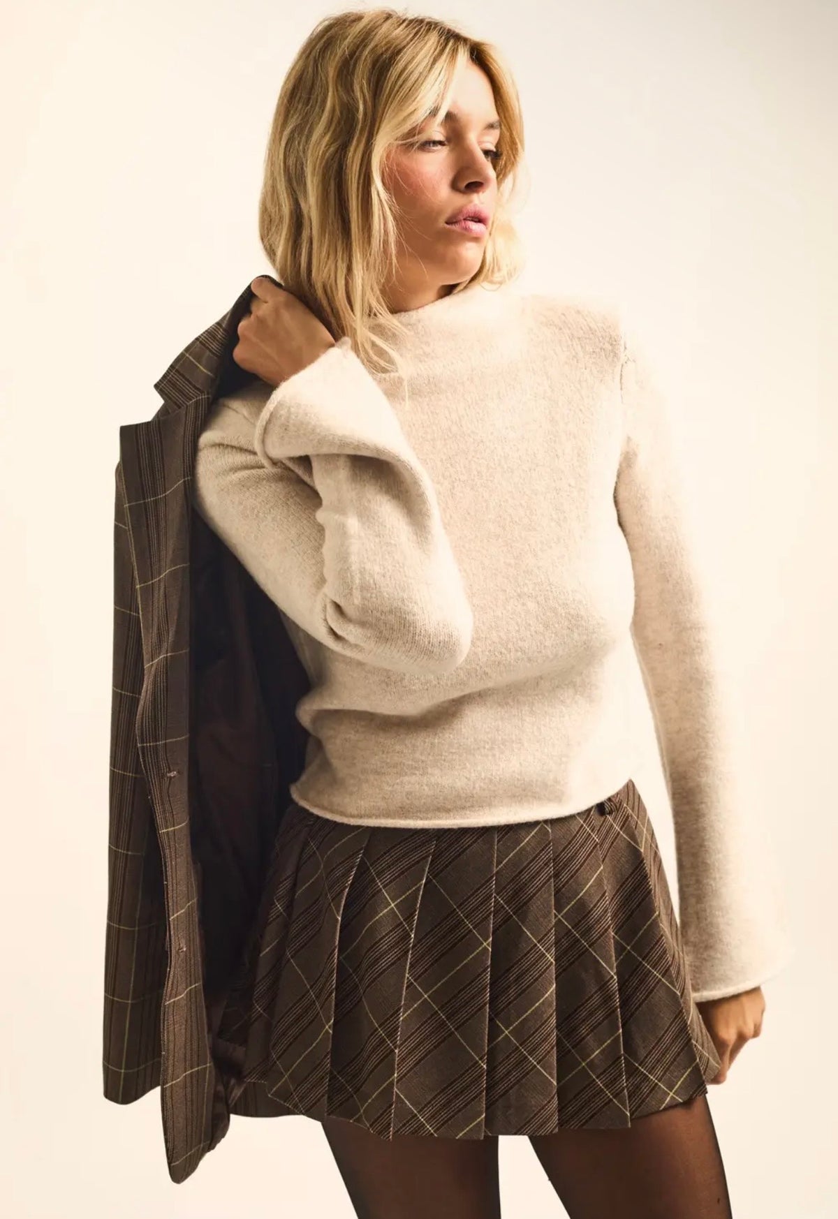 Solid Knit Mock-Neck Bell-Sleeve
Rolled-Edge Crop Sweater
