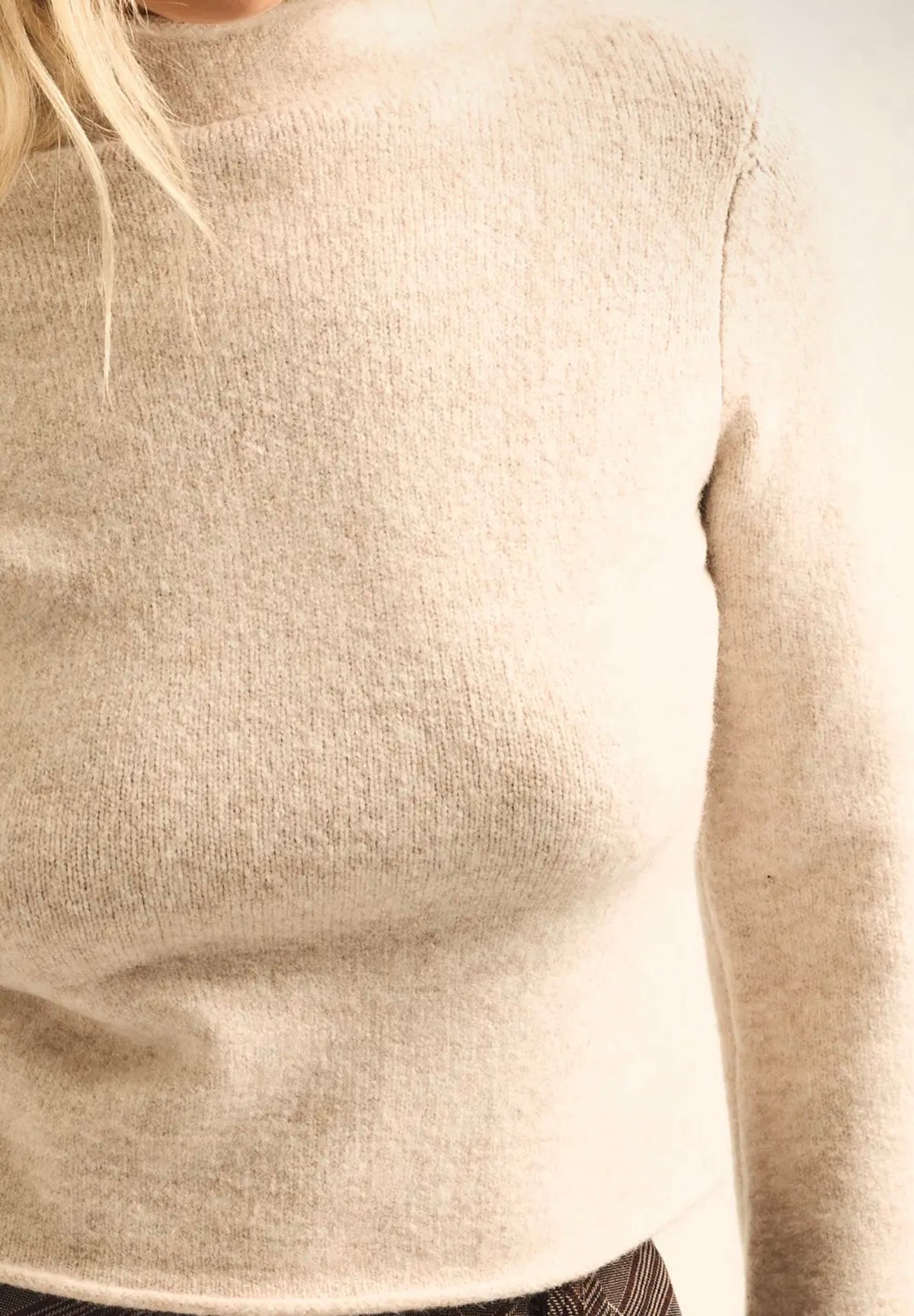 Solid Knit Mock-Neck Bell-Sleeve
Rolled-Edge Crop Sweater