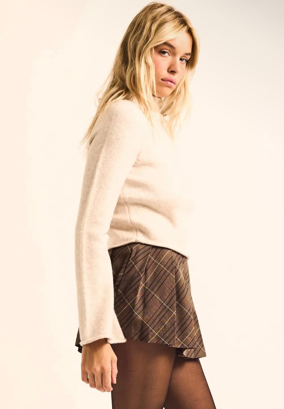 Solid Knit Mock-Neck Bell-Sleeve
Rolled-Edge Crop Sweater